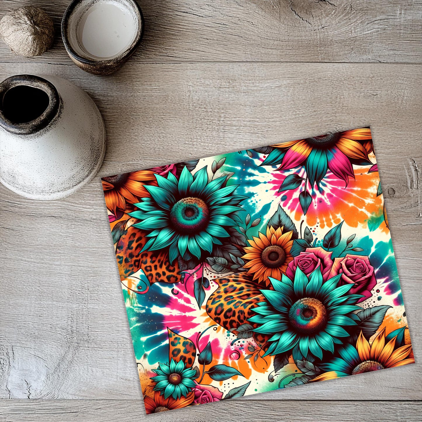 a placemat with colorful flowers on a wooden table