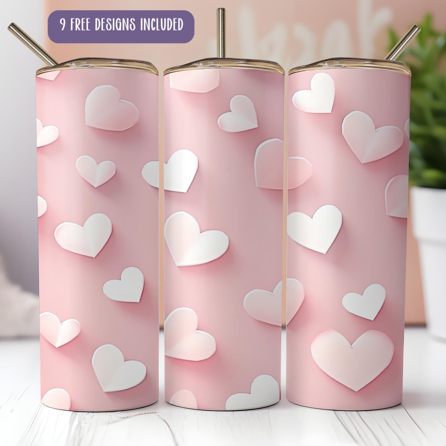 a set of three pink tumblers with hearts on them