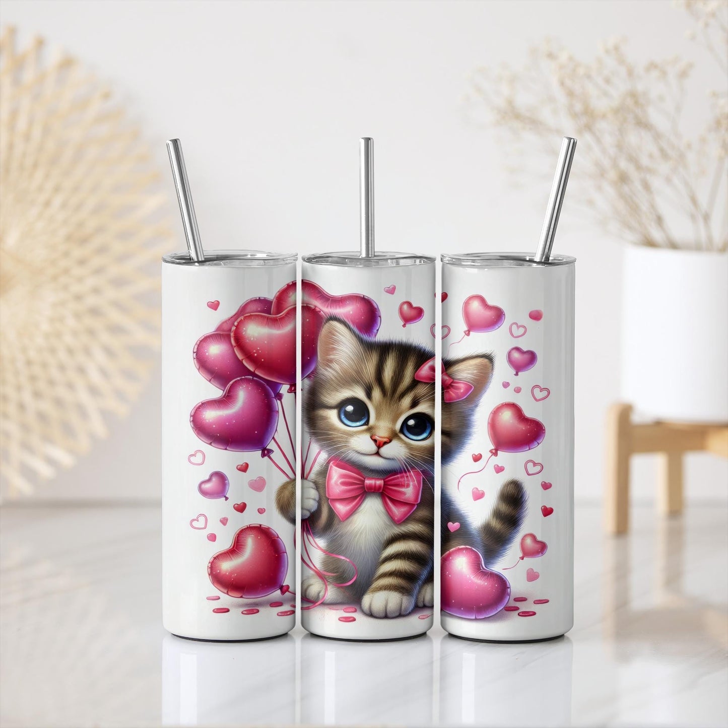 a couple of cups with a cat on them