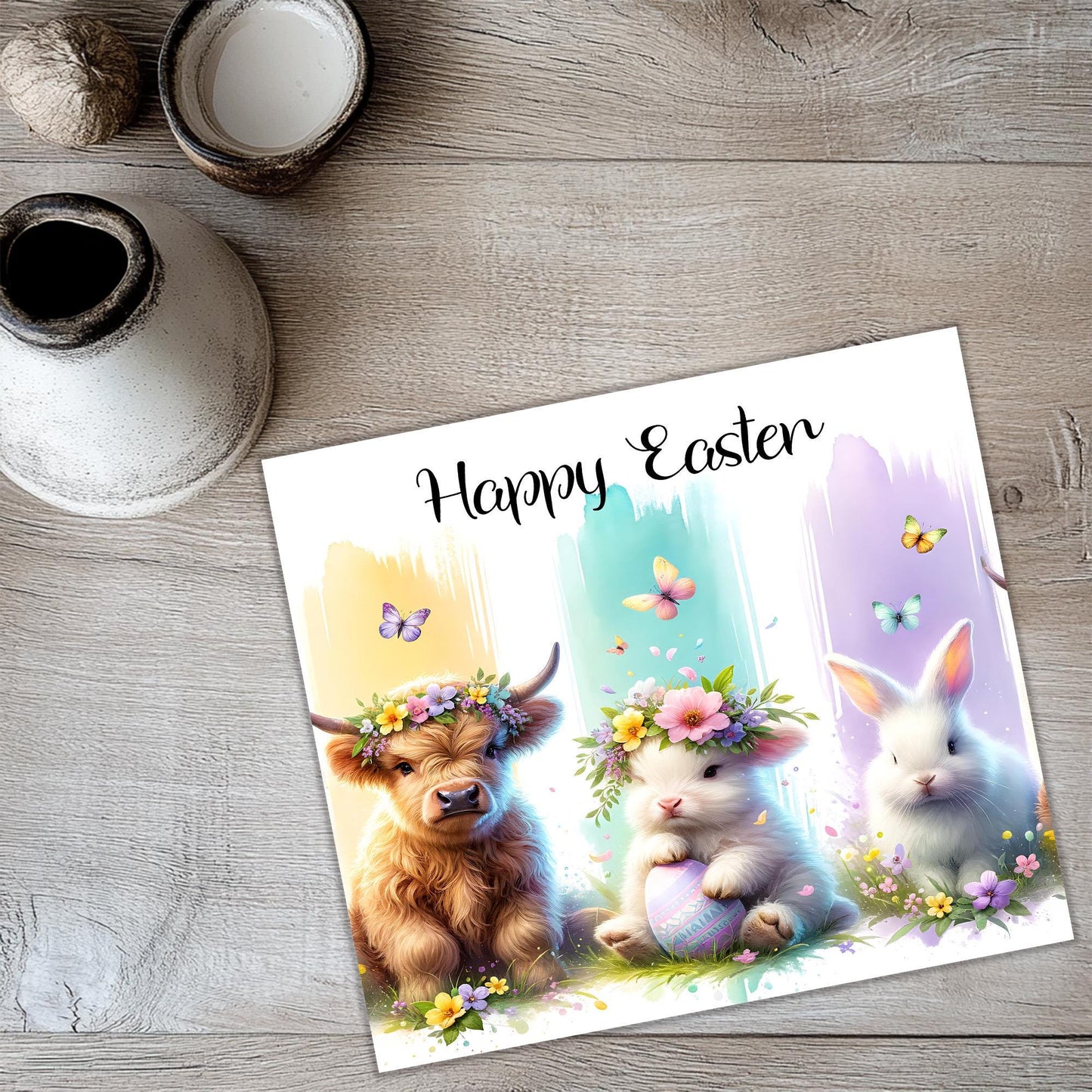 a card with a picture of two rabbits and a cow