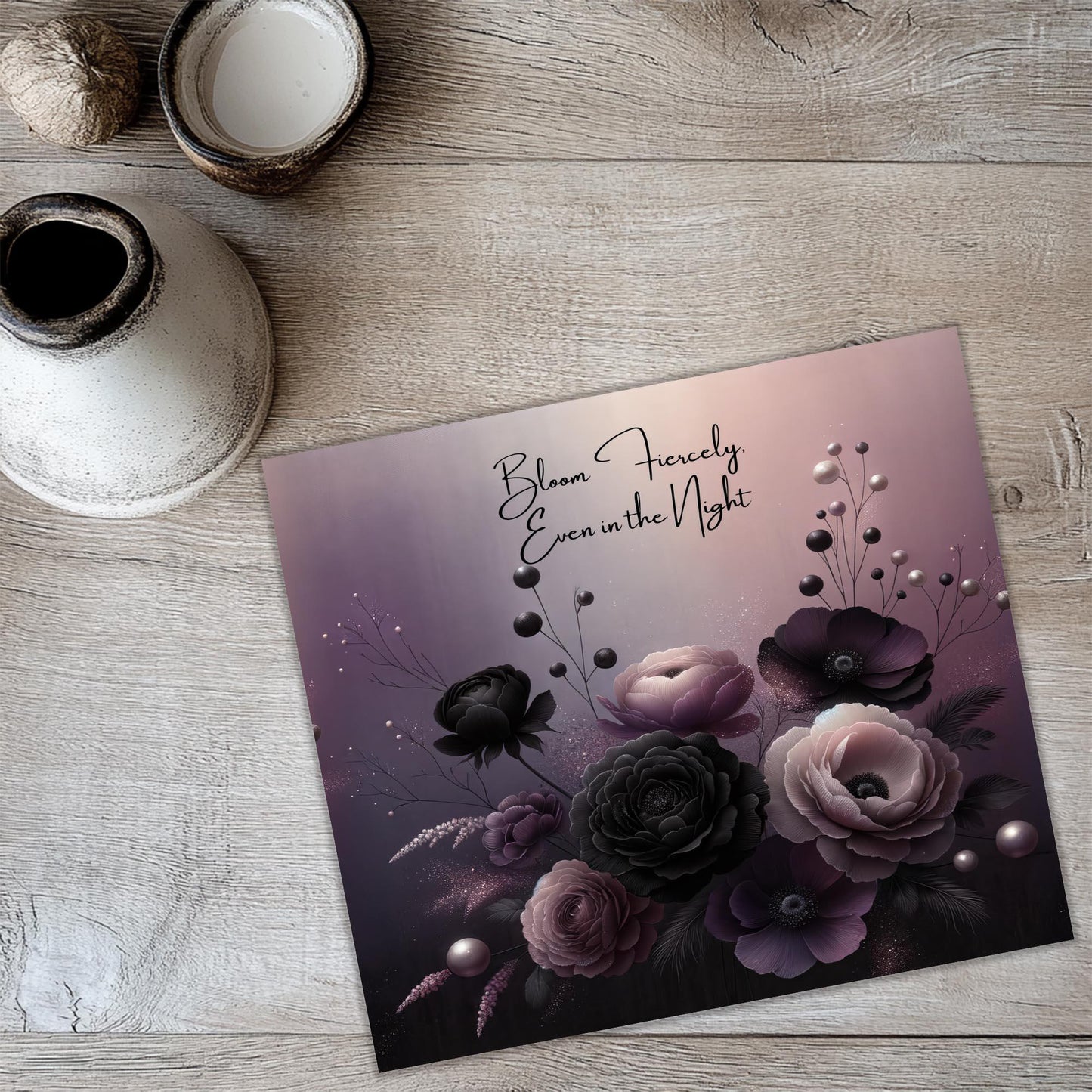 a greeting card with flowers on a table