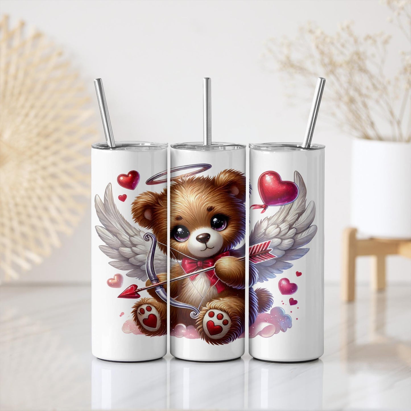 a set of three tumbles with a picture of a teddy bear