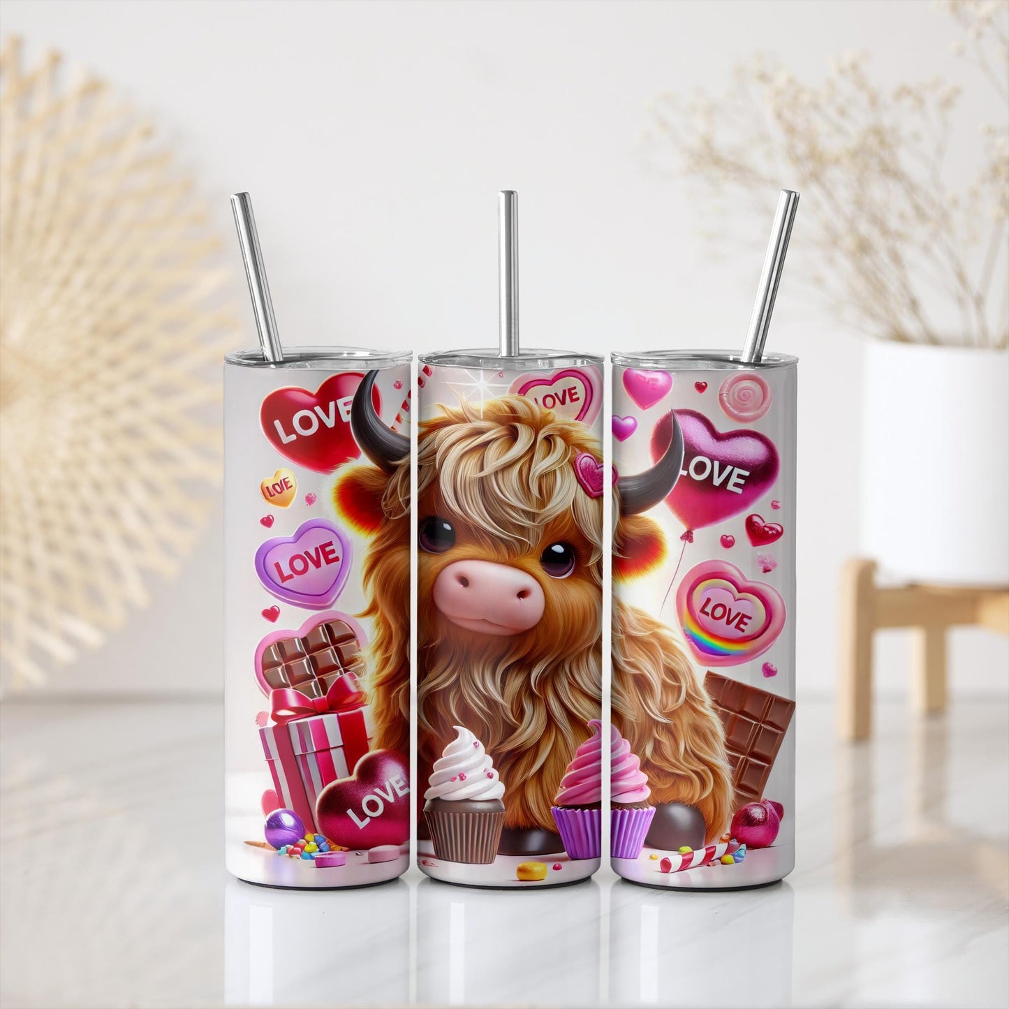 a couple of cups that have some kind of cow on them