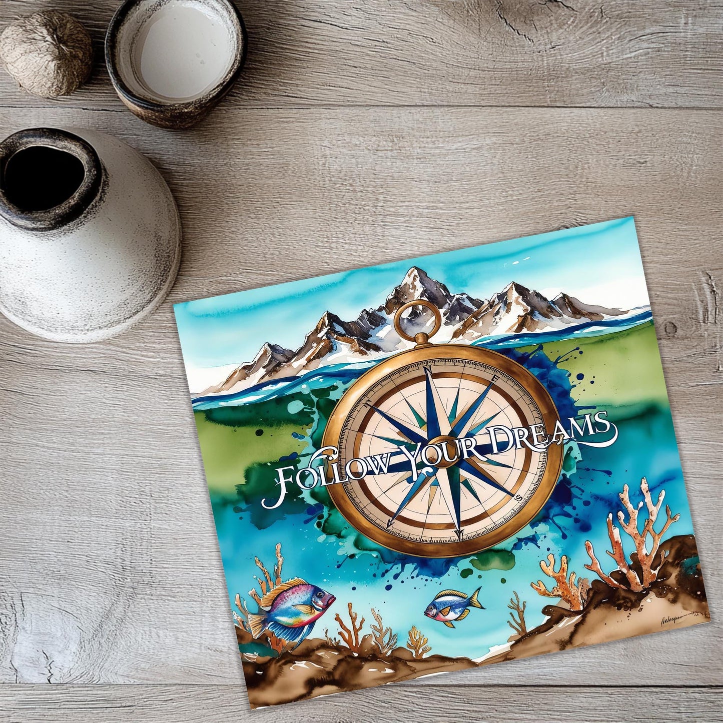 a coaster with a picture of a compass on it
