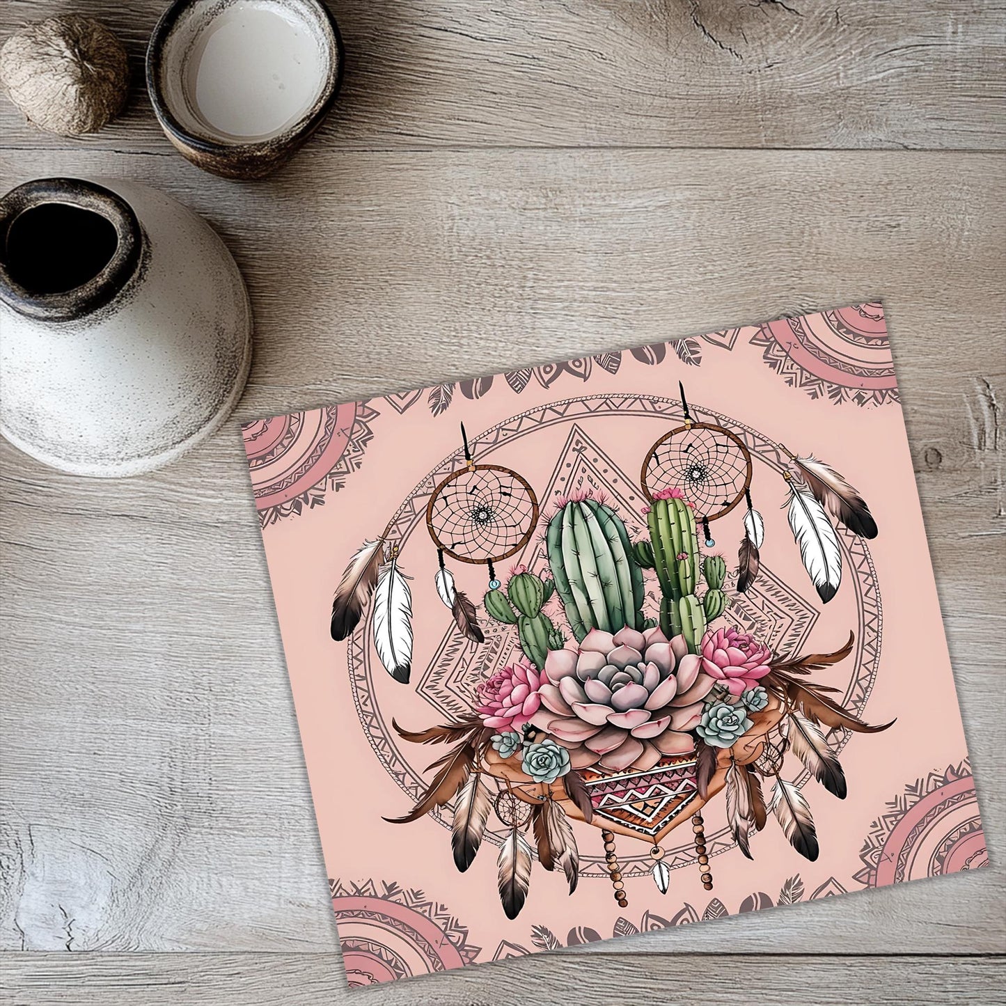 a picture of a cactus with feathers and flowers