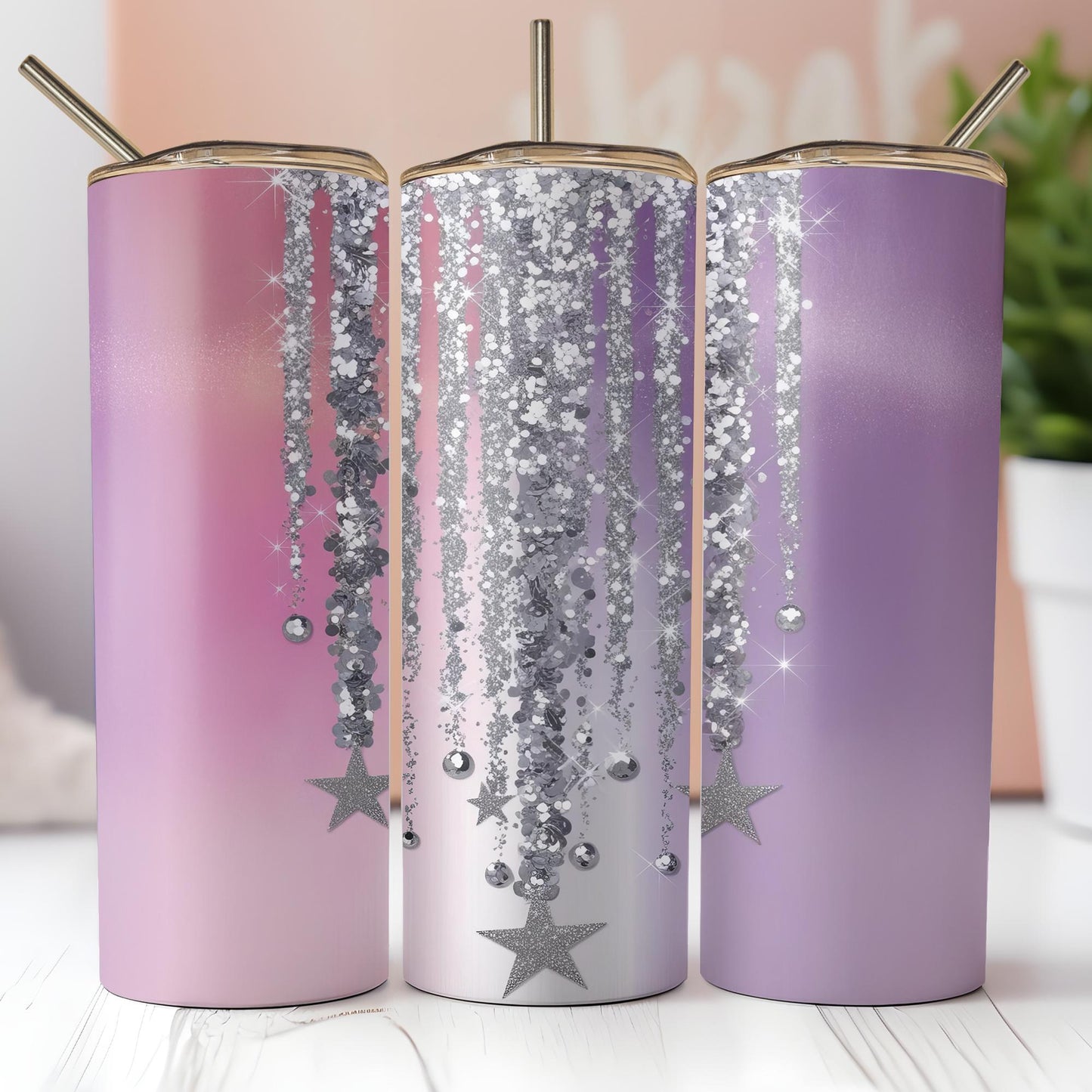 a couple of pink and purple tumbles sitting on top of a table