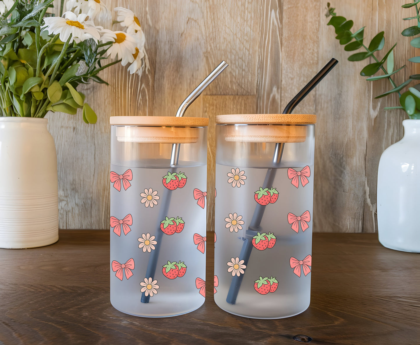 a couple of cups sitting on top of a wooden table