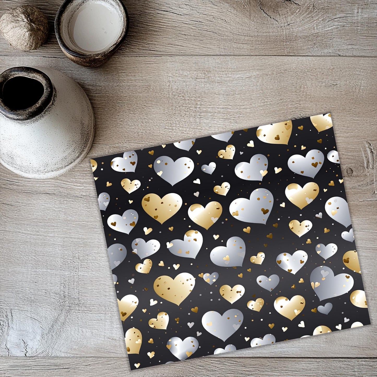 a table with a black and gold heart pattern on it