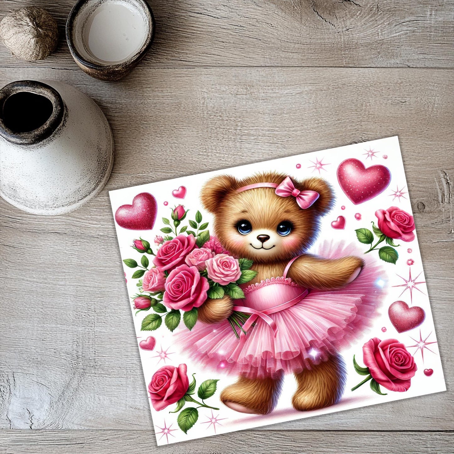 a picture of a teddy bear in a pink dress