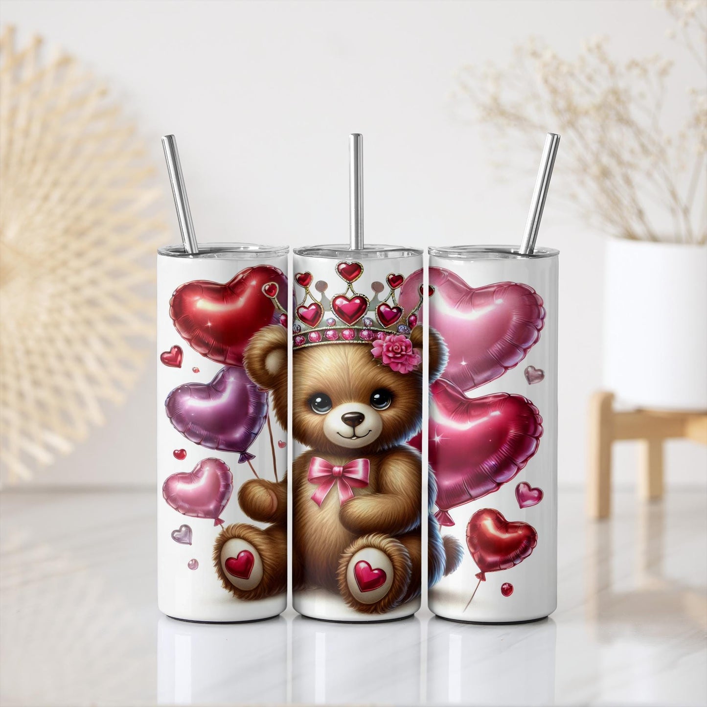 a set of three tumbles with a picture of a teddy bear