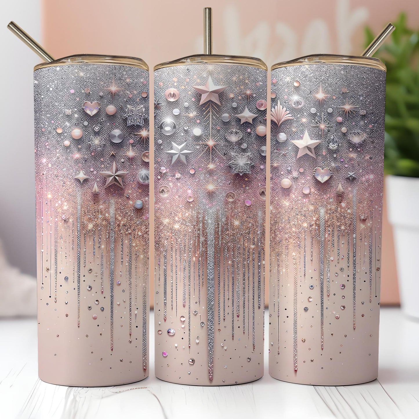 a set of three tumbles with stars on them