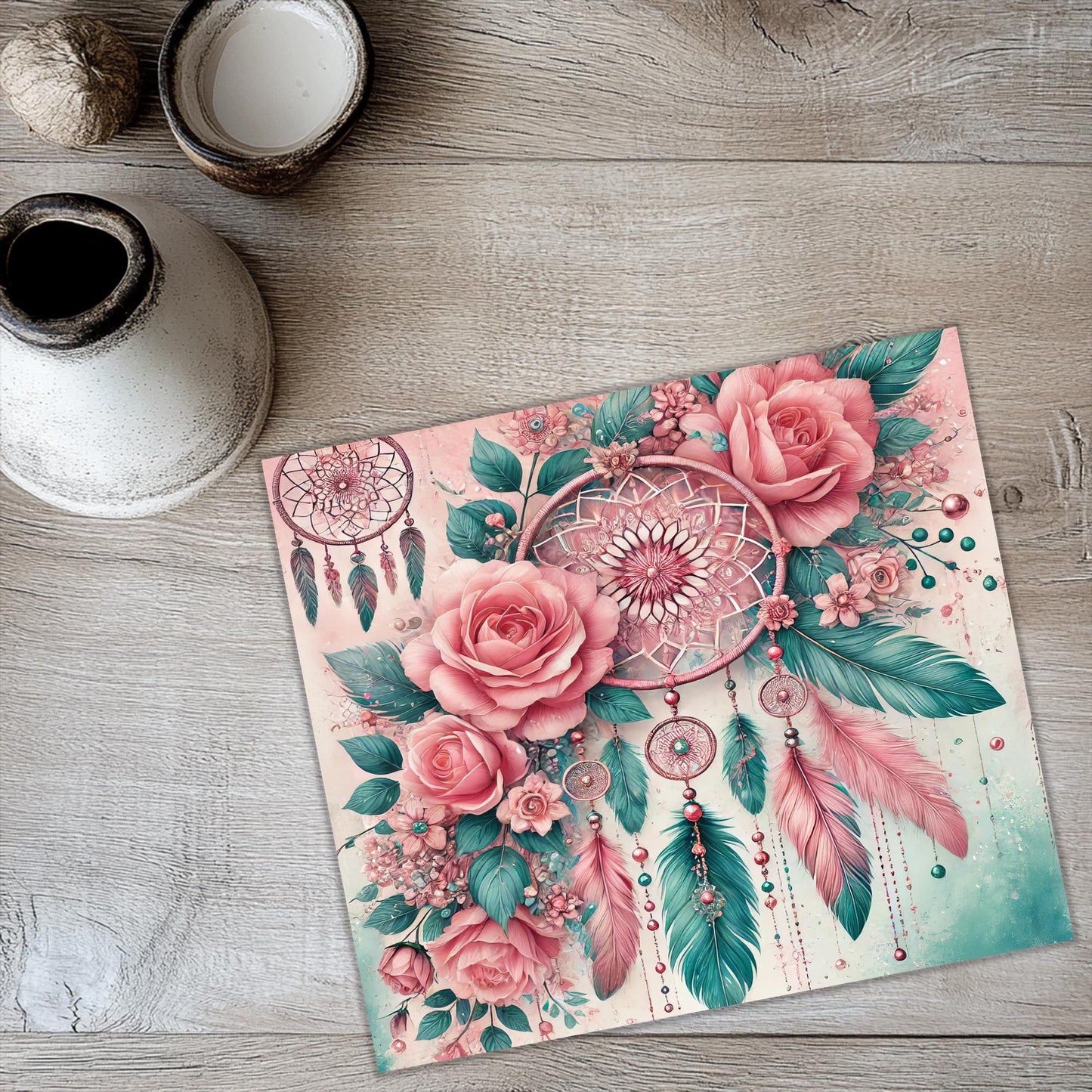 a painting of flowers and feathers on a wooden floor