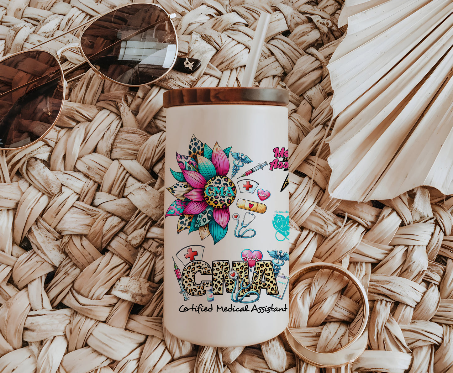 a white coffee cup with a floral design on it