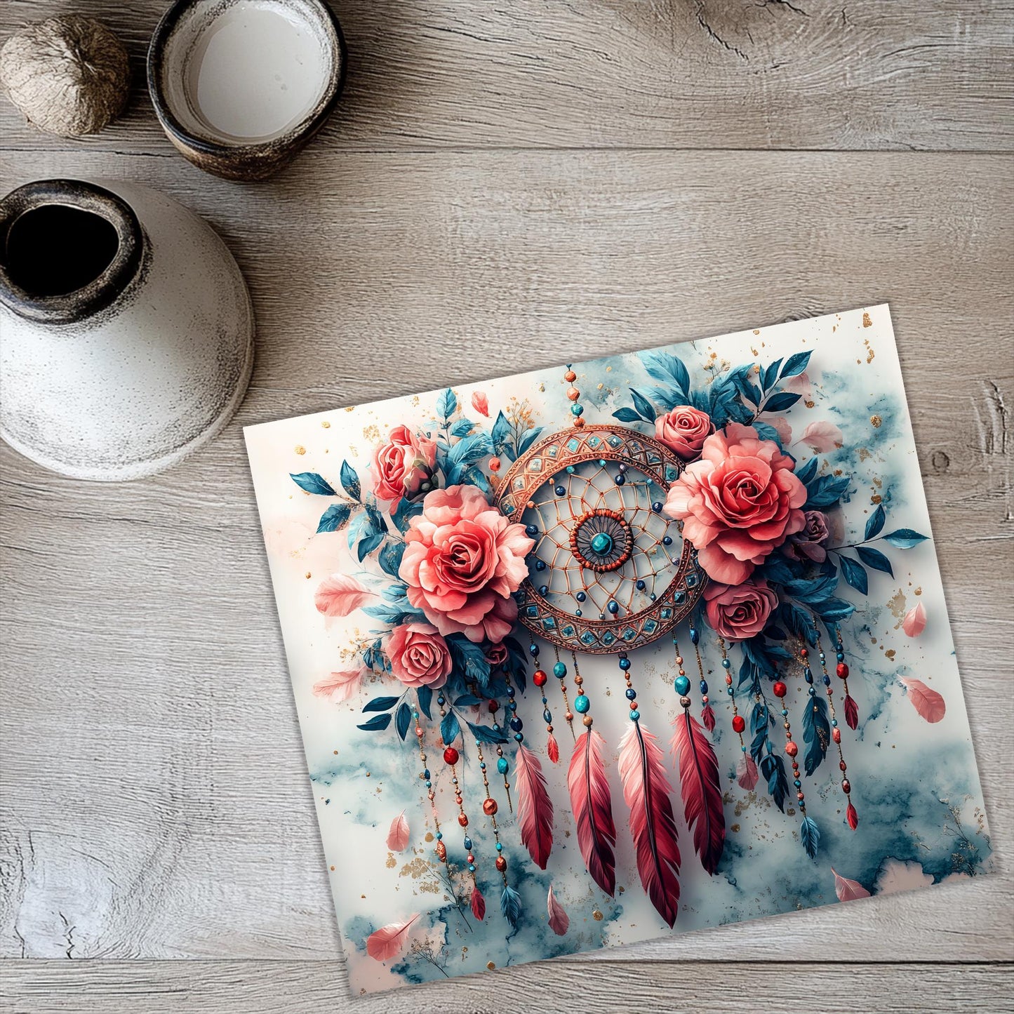 a picture of a dream catcher with roses and feathers