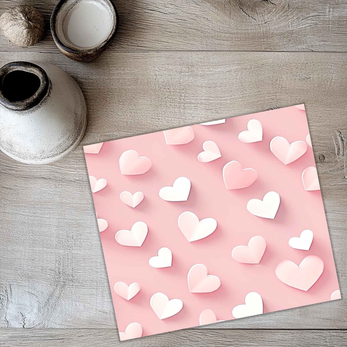 a paper cut out of hearts on a table