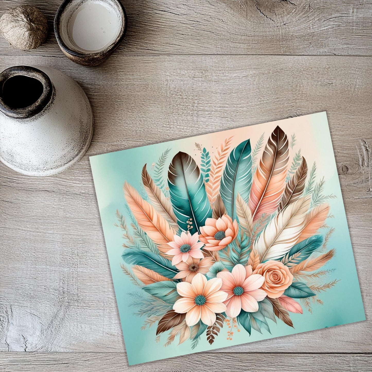 a painting of flowers and feathers on a table