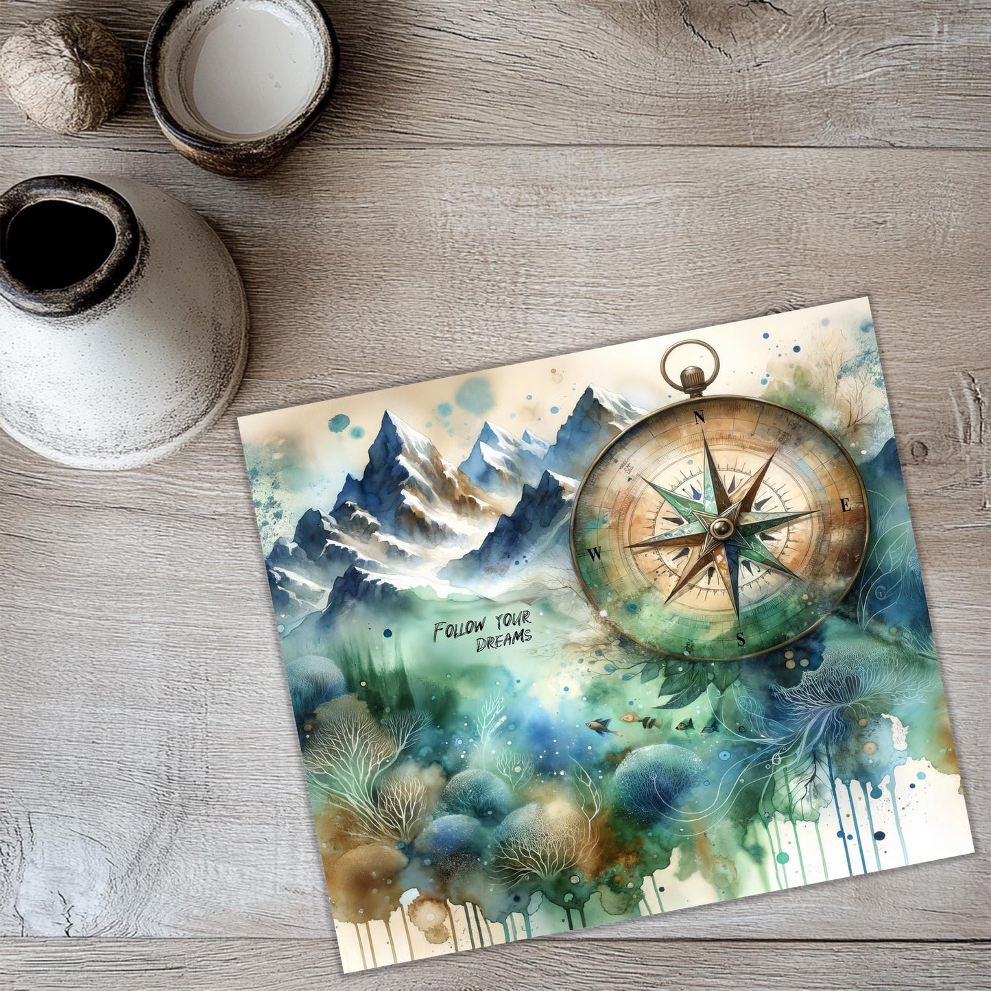 a painting of a compass on a table