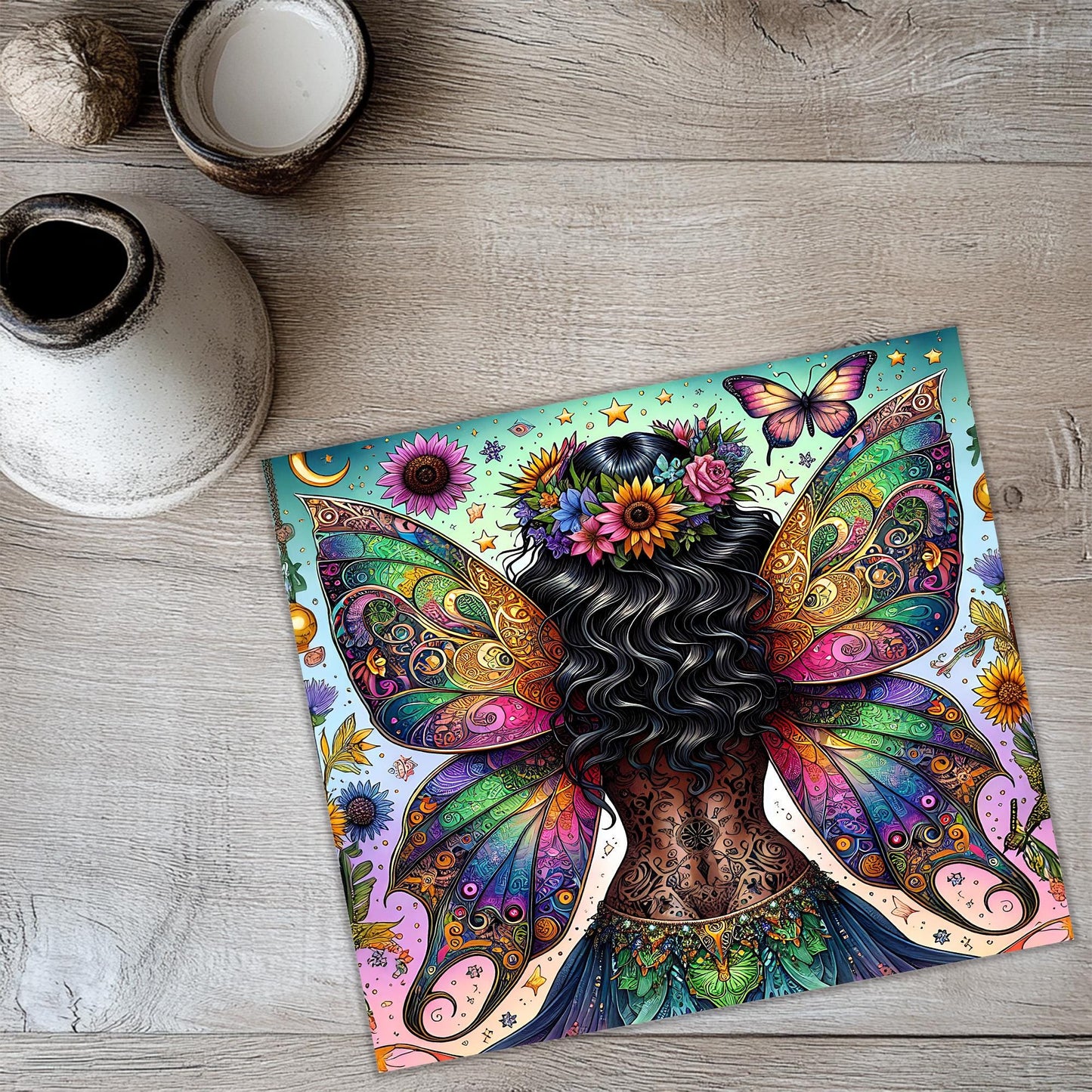 a painting of a woman's face with butterflies on it