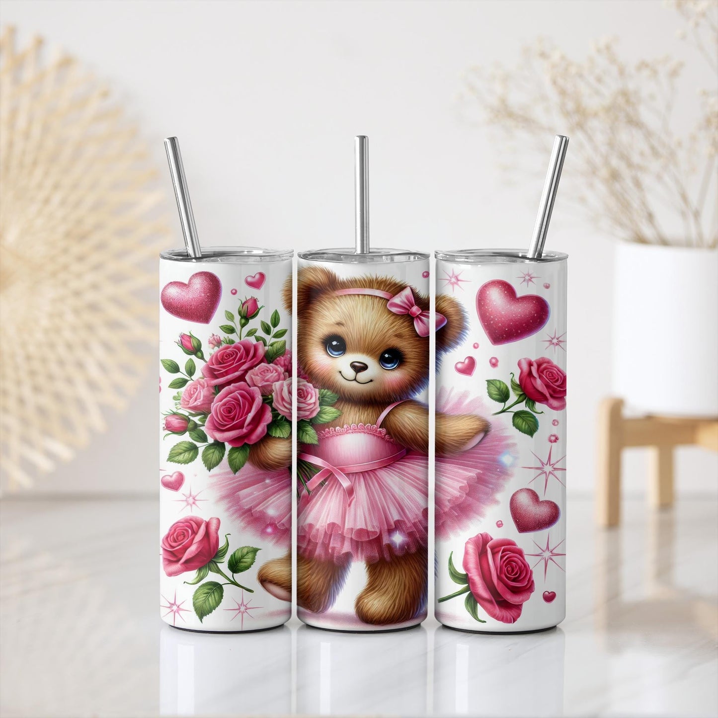 a set of three tumbles with a teddy bear on them