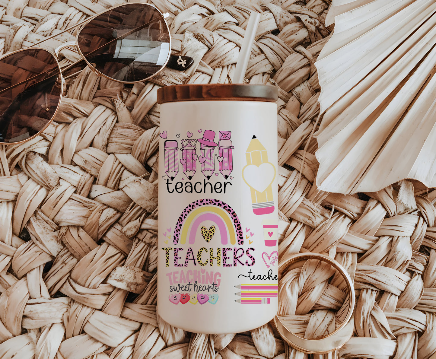 a can of teacher's coffee next to a pair of sunglasses