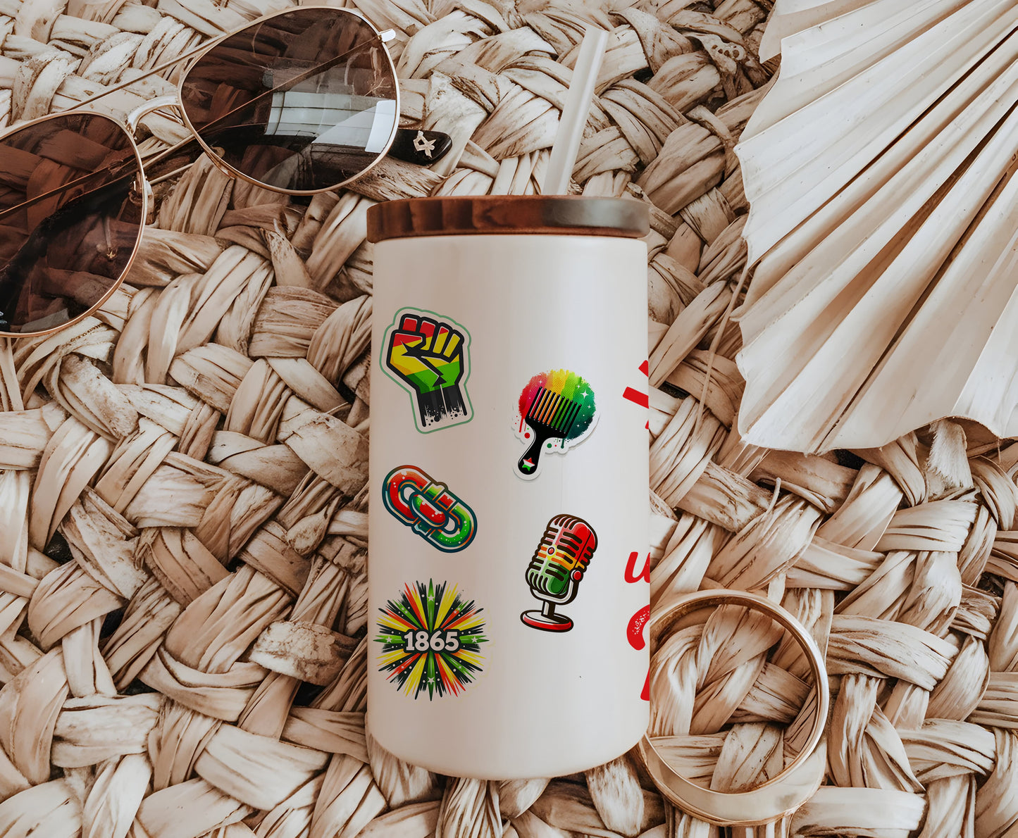 a white coffee cup with stickers on it