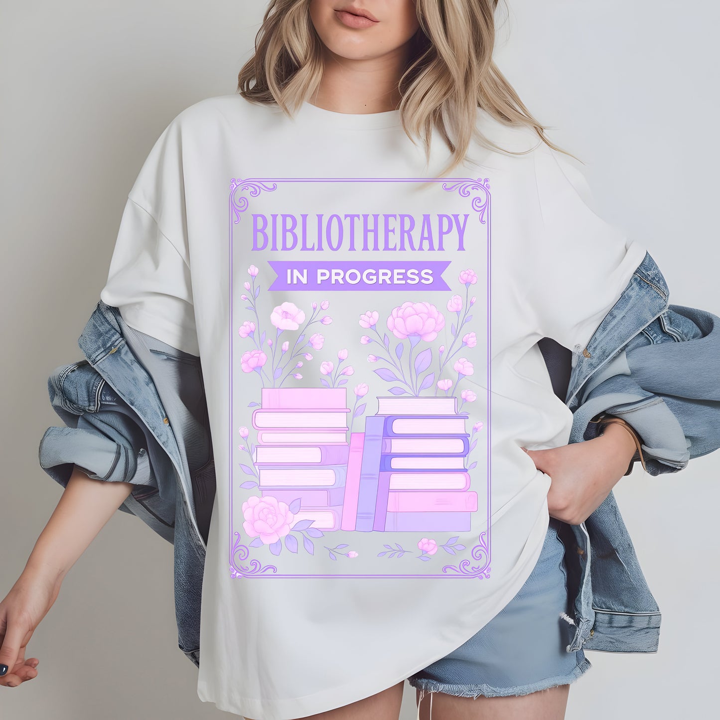 a woman wearing a t - shirt that reads bibliotary in progress