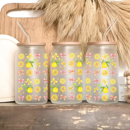 a set of three water bottles sitting on top of a counter