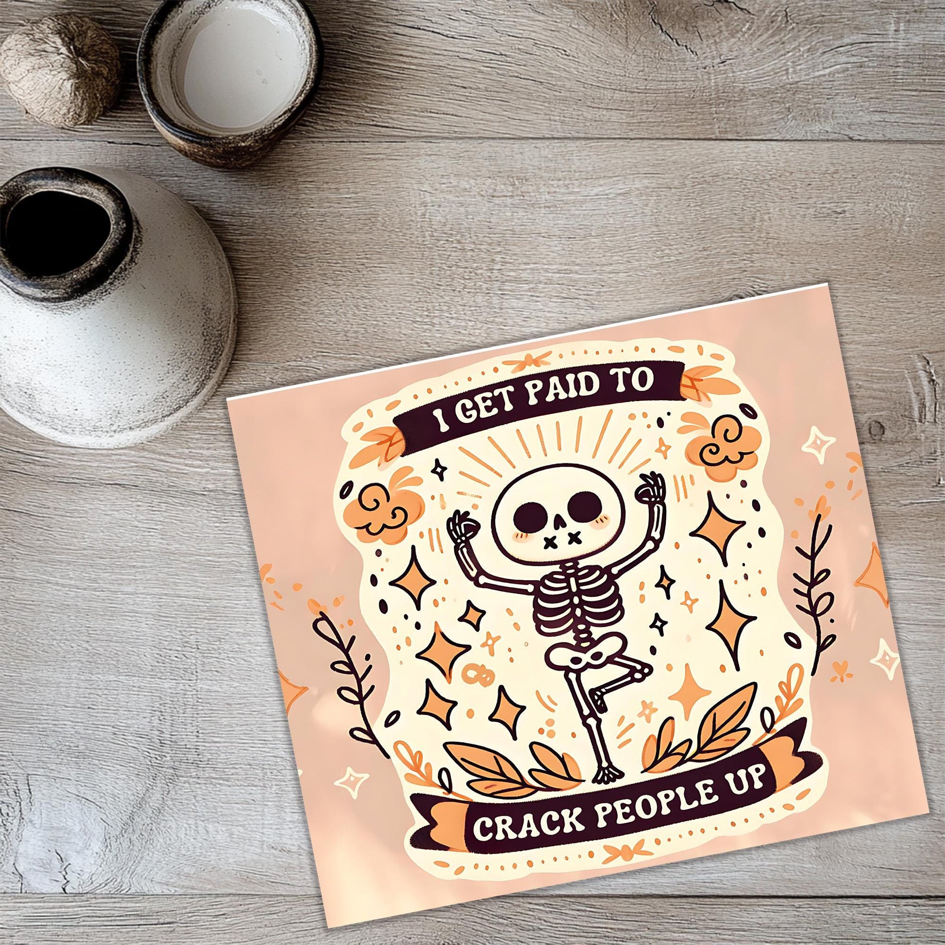 a card with a skeleton on it on a table