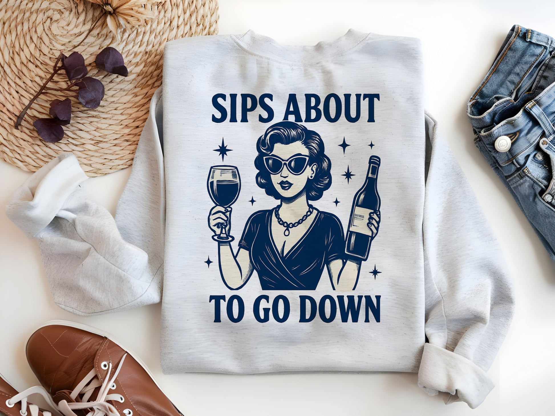 a sweater with a woman holding a glass of wine
