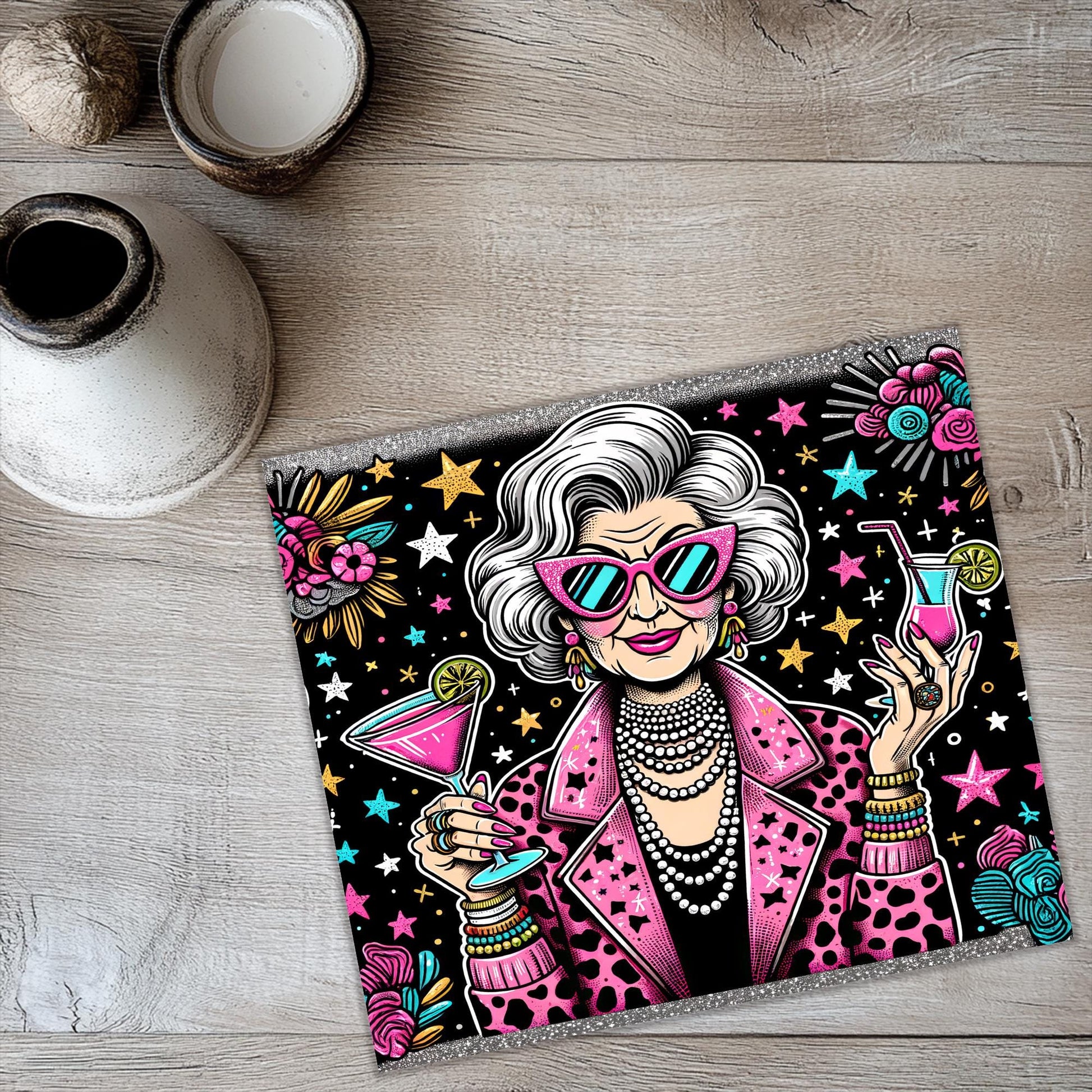 a picture of an old woman holding a drink