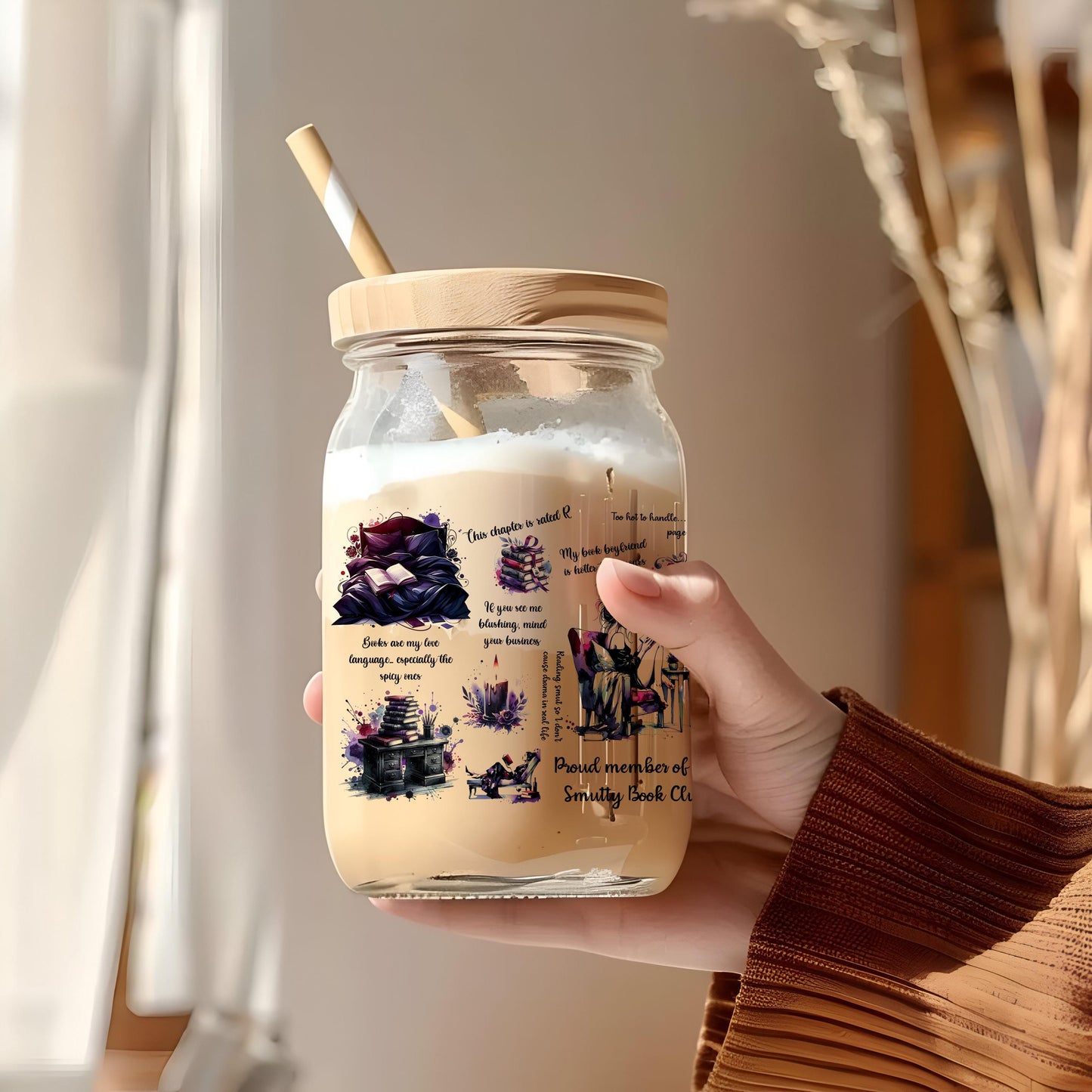 a person holding a jar of food with a straw in it