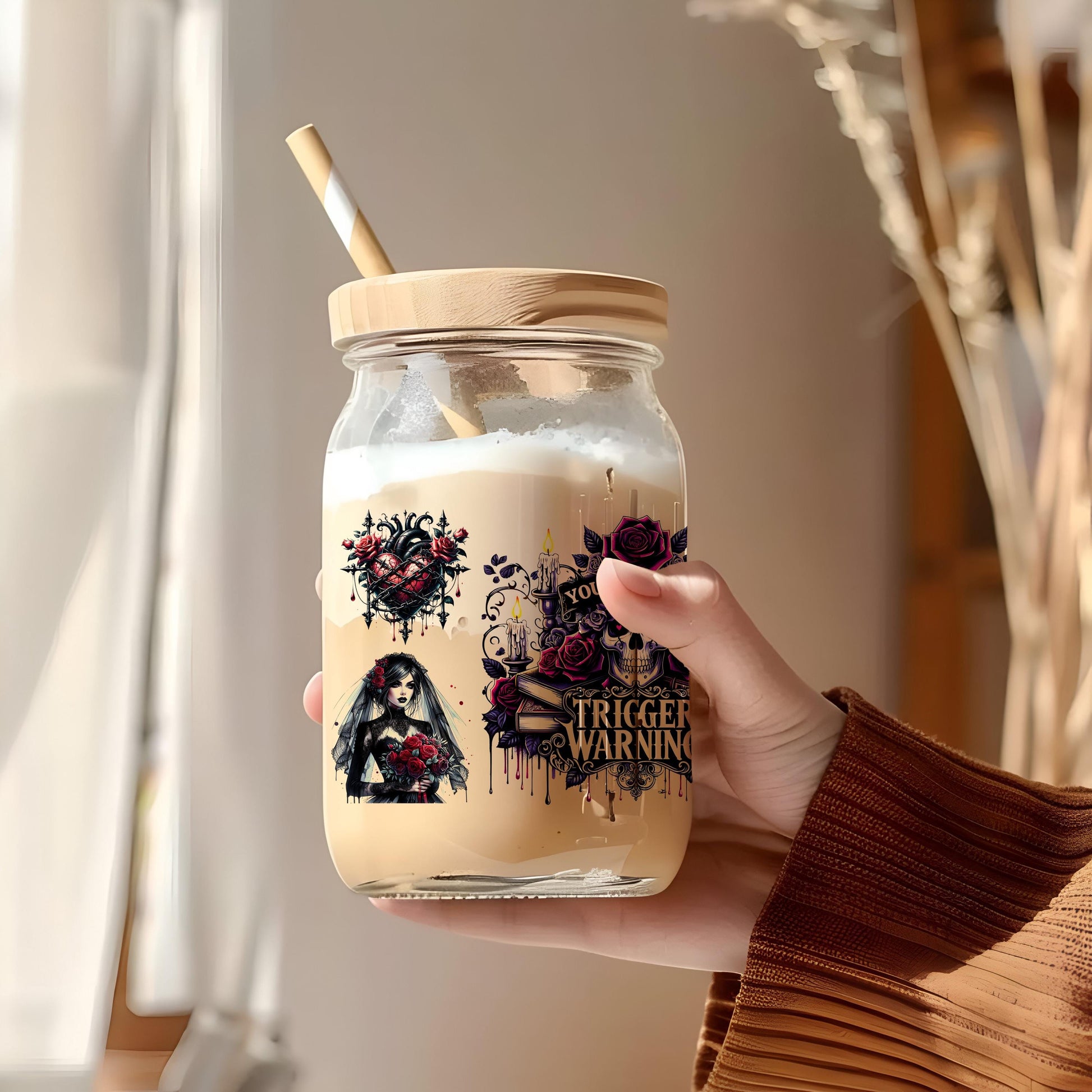 a person holding a jar with a straw in it