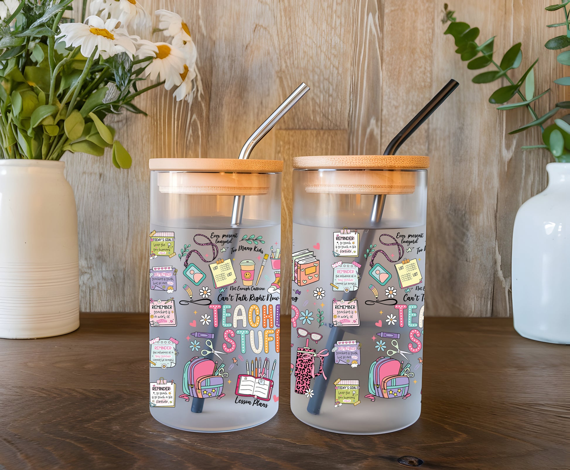 a couple of cups sitting on top of a wooden table