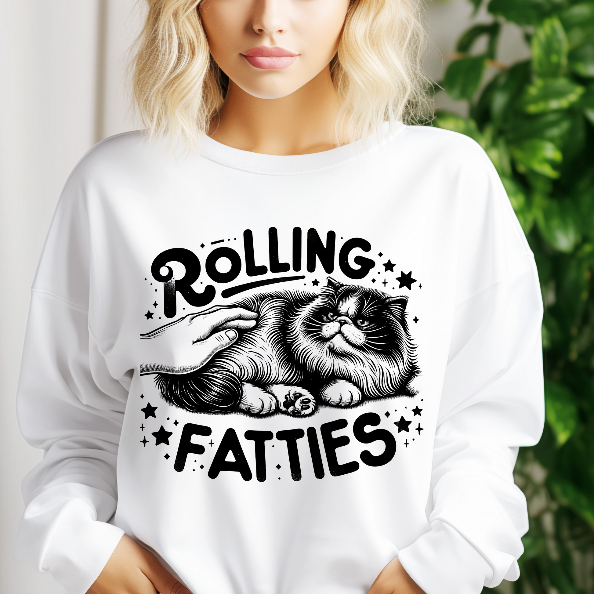 a woman wearing a white shirt with a cat on it