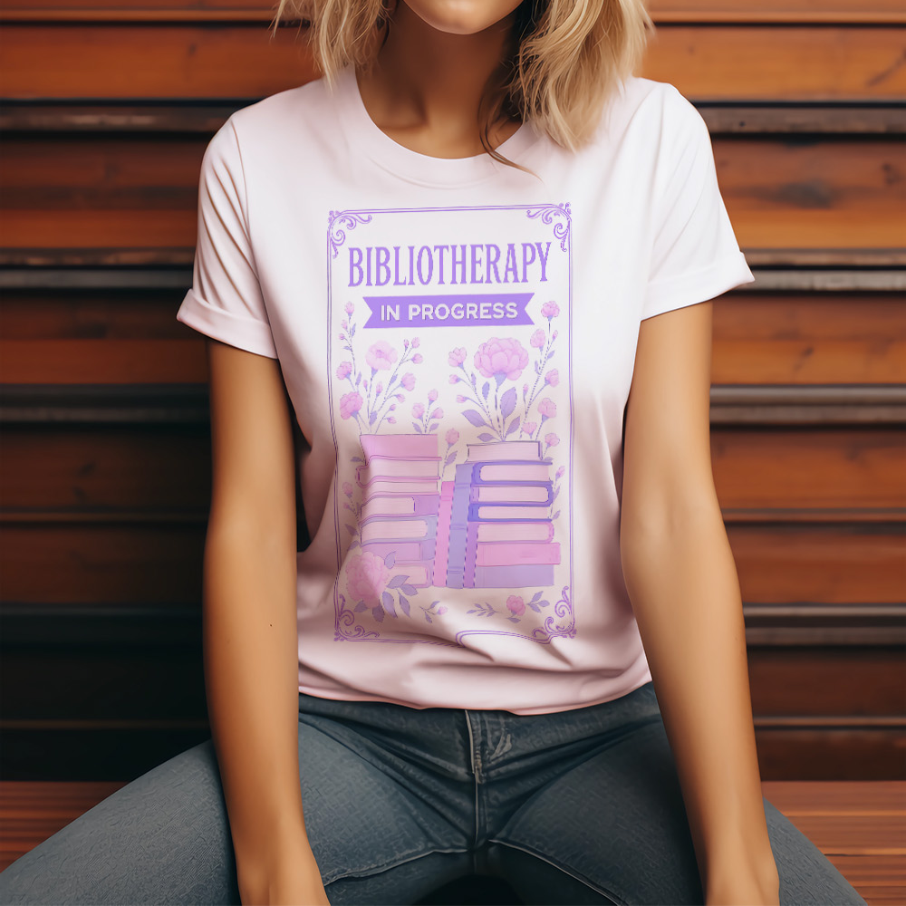 a woman sitting on the floor wearing a t - shirt