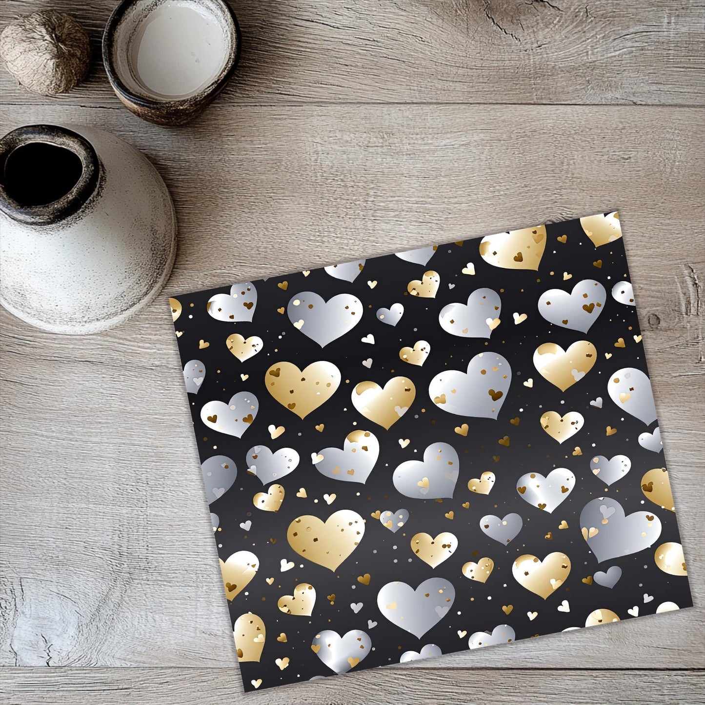 a table with a black and gold heart pattern on it