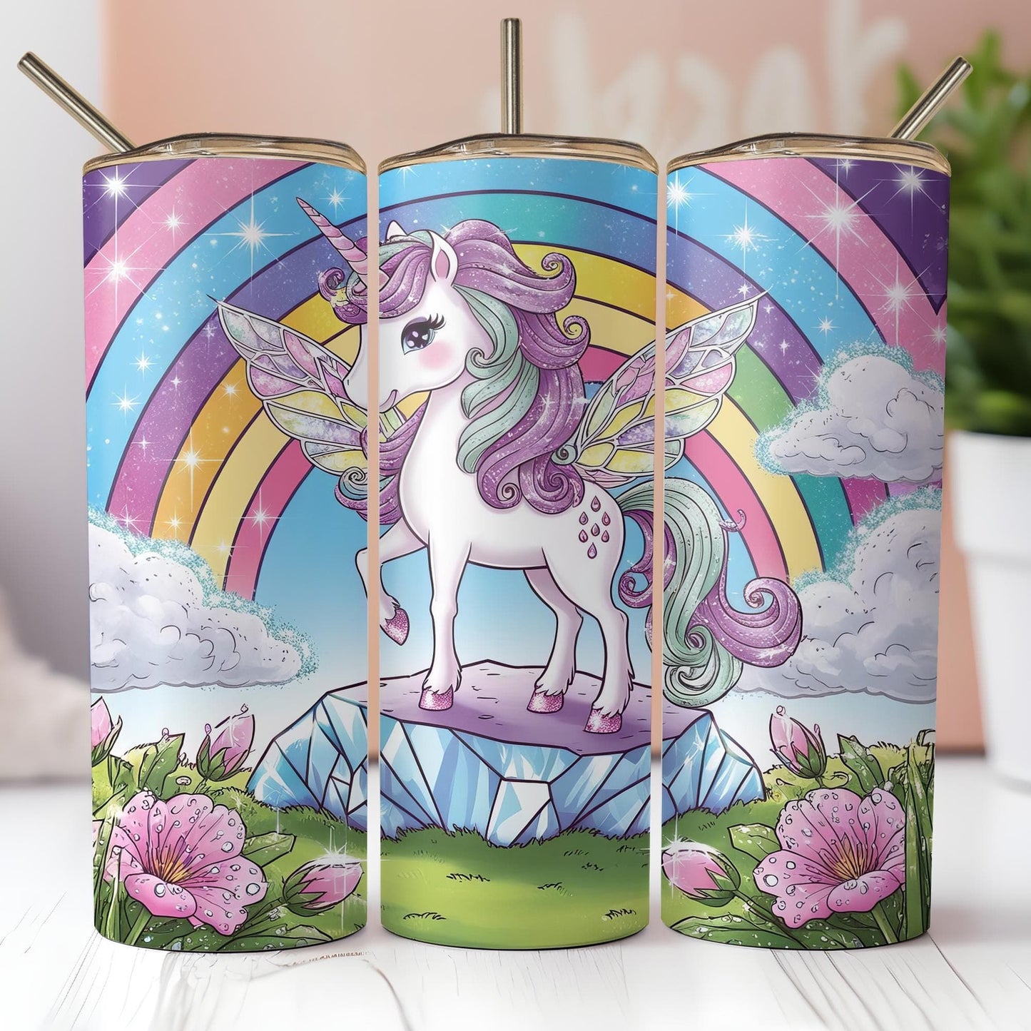 a set of three unicorn candles sitting on top of a table