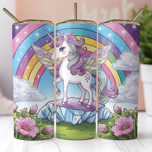 a set of three unicorn candles sitting on top of a table