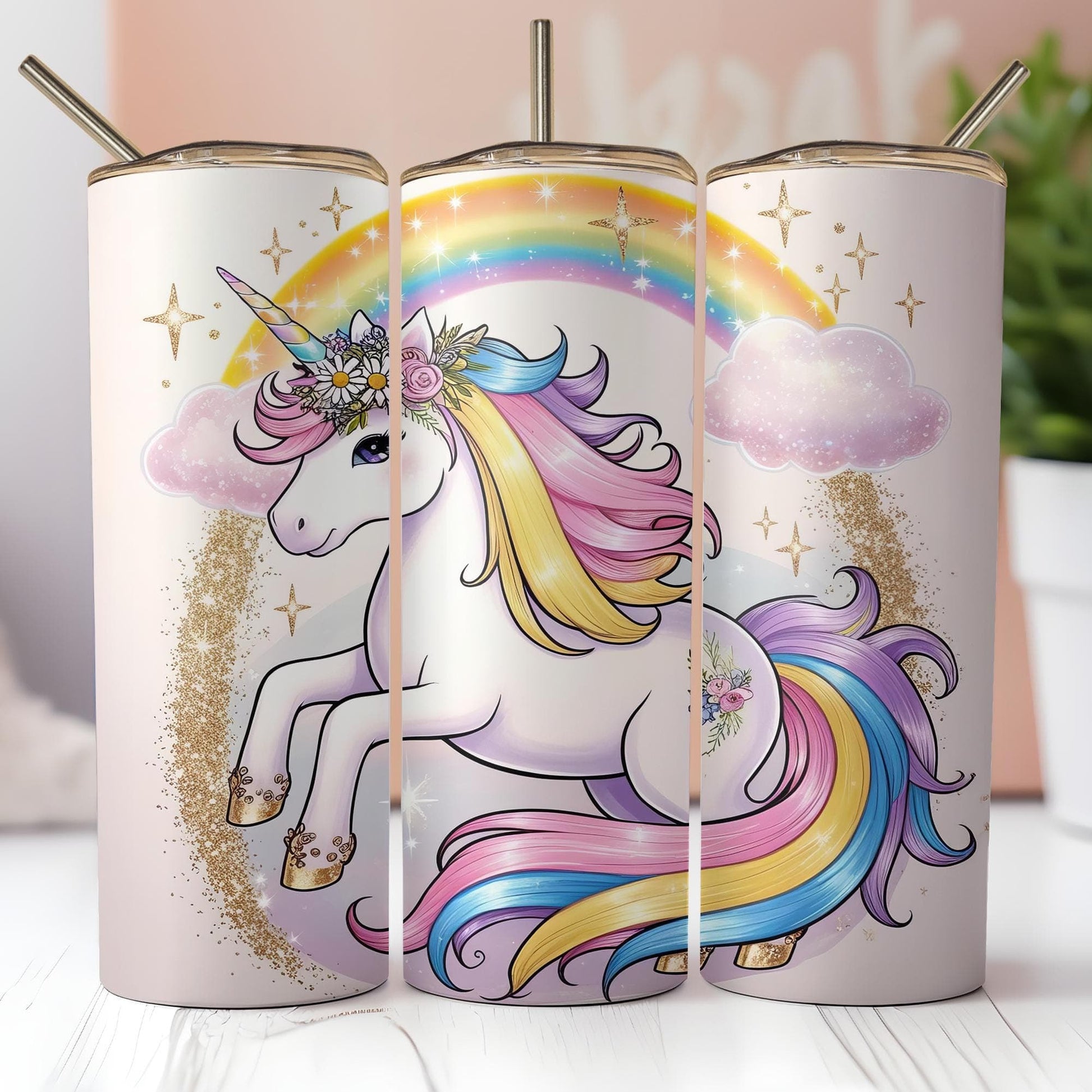 a group of three unicorn tumblers sitting on top of a table