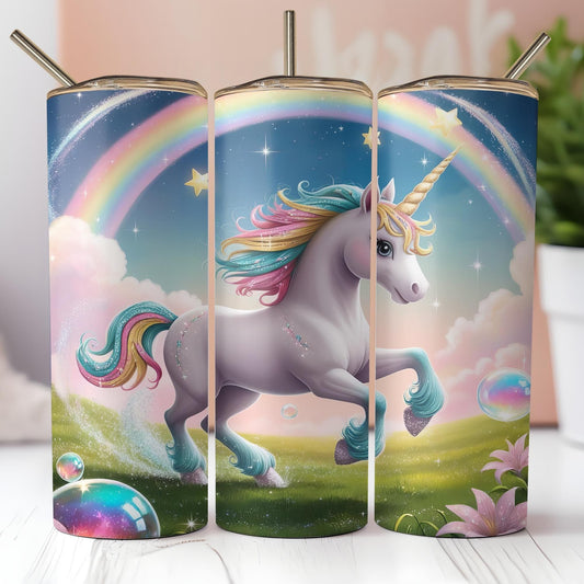 three colorful unicorns with a rainbow in the background