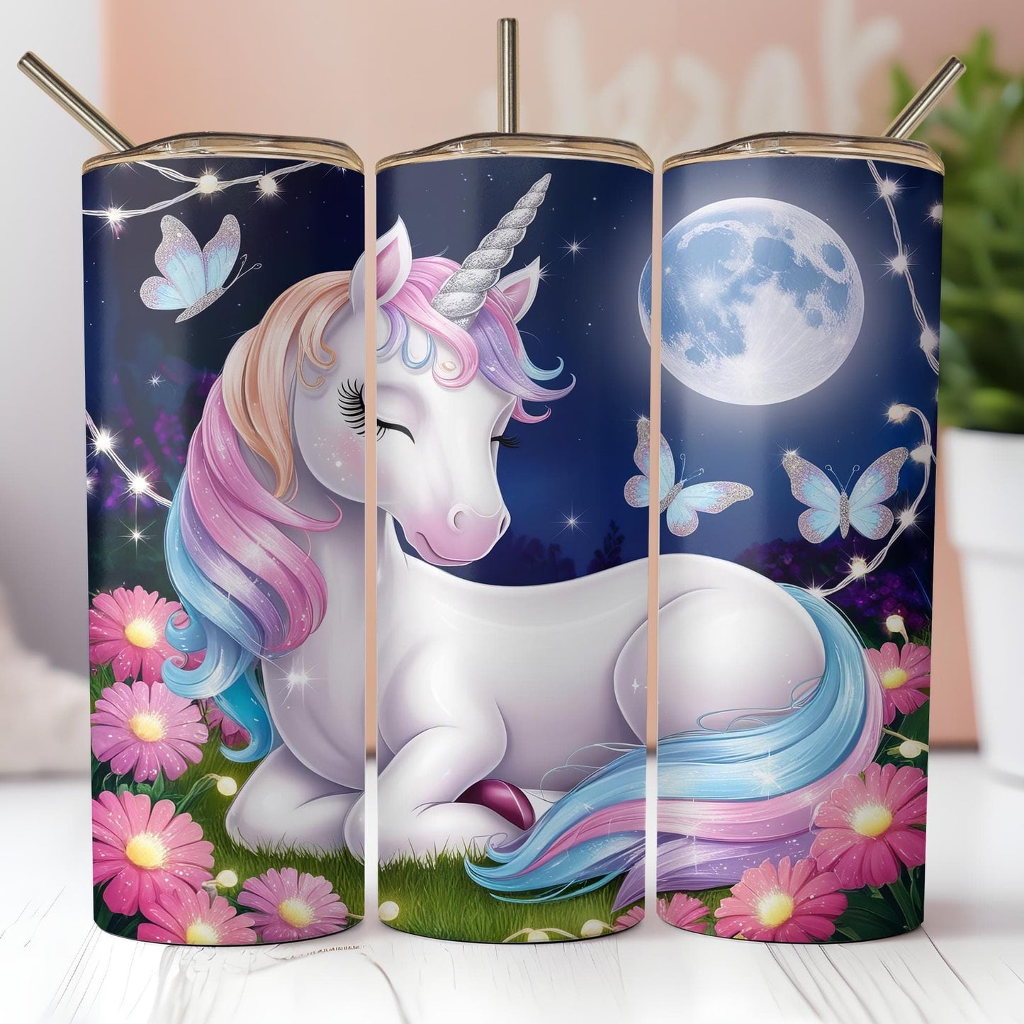 three colorful unicorns are sitting in the grass