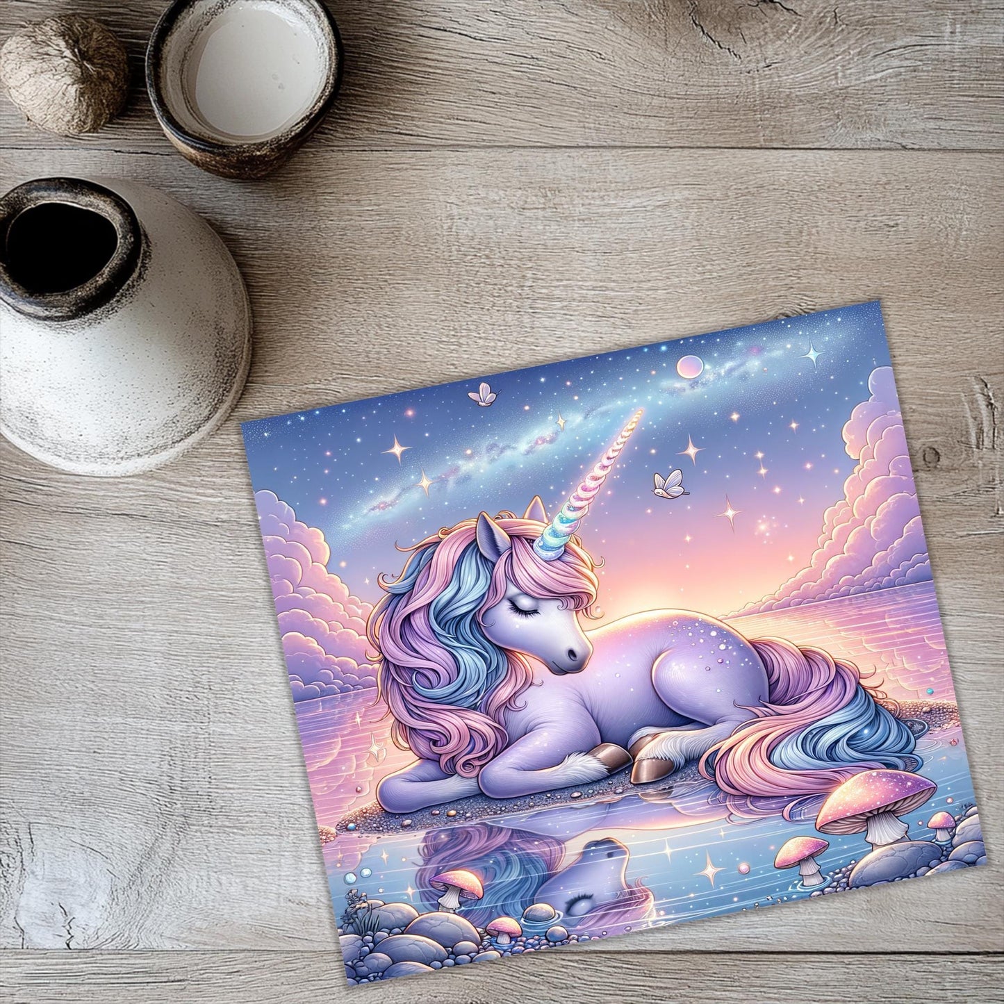 a picture of a unicorn laying on the ground