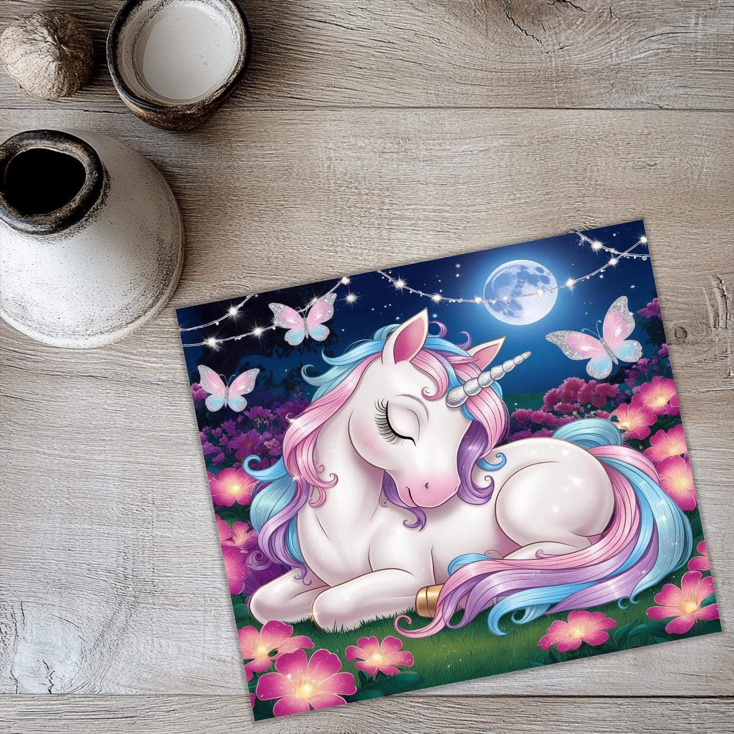 a picture of a unicorn laying on the ground