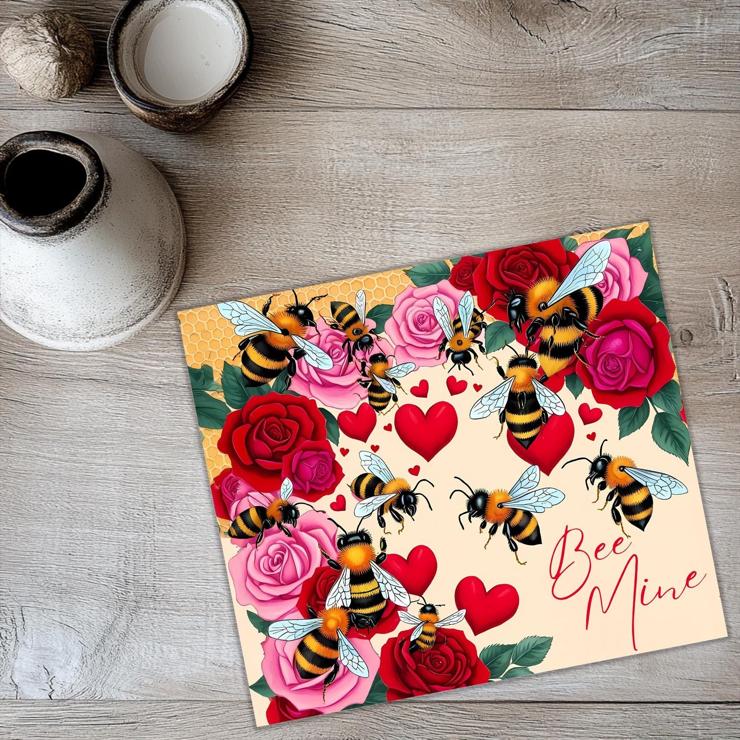 a card with bees and roses on it