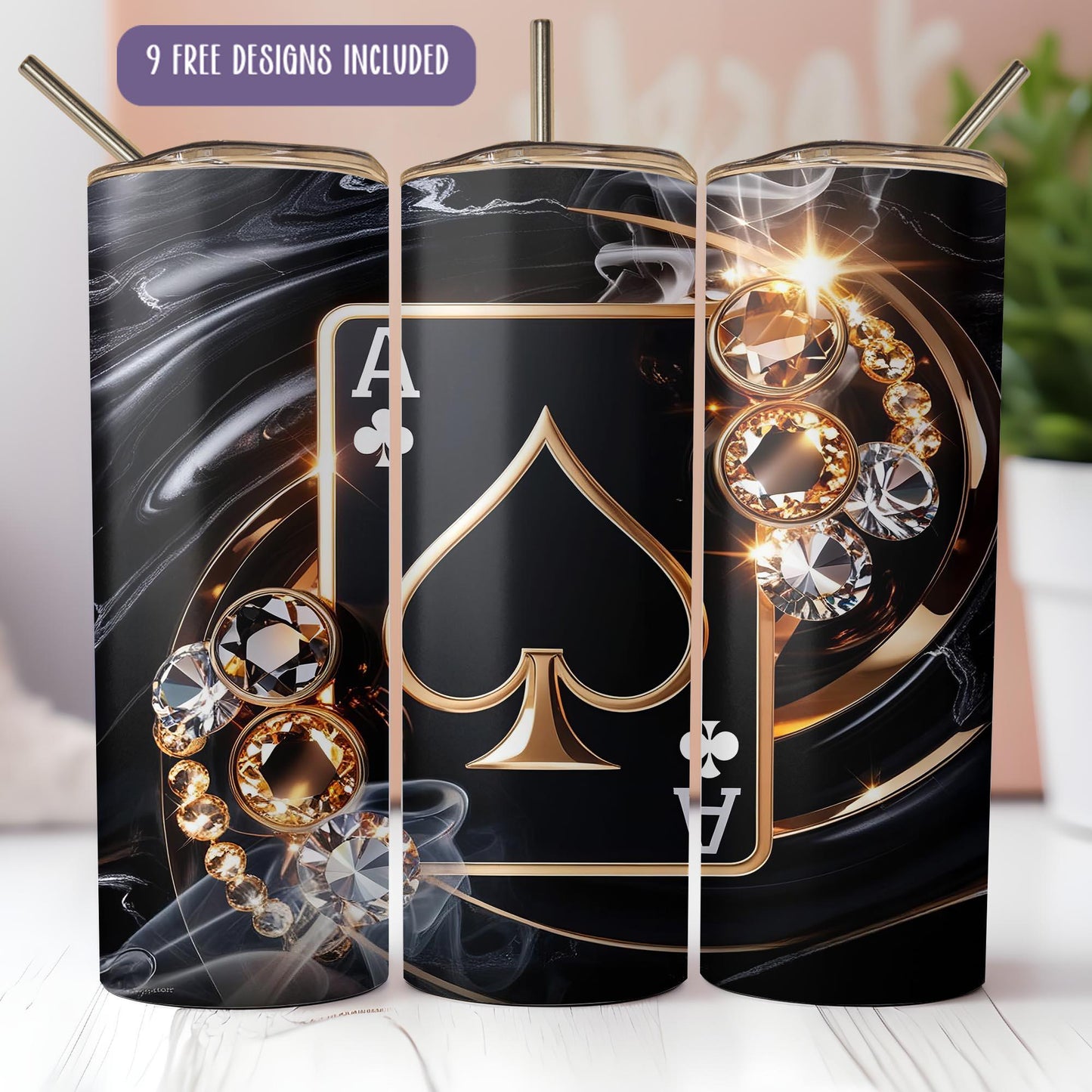 a set of three black and gold playing cards