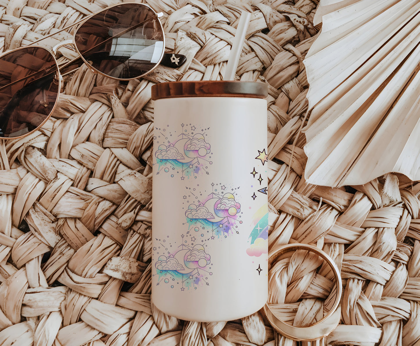 a white coffee cup sitting on top of a wicker table