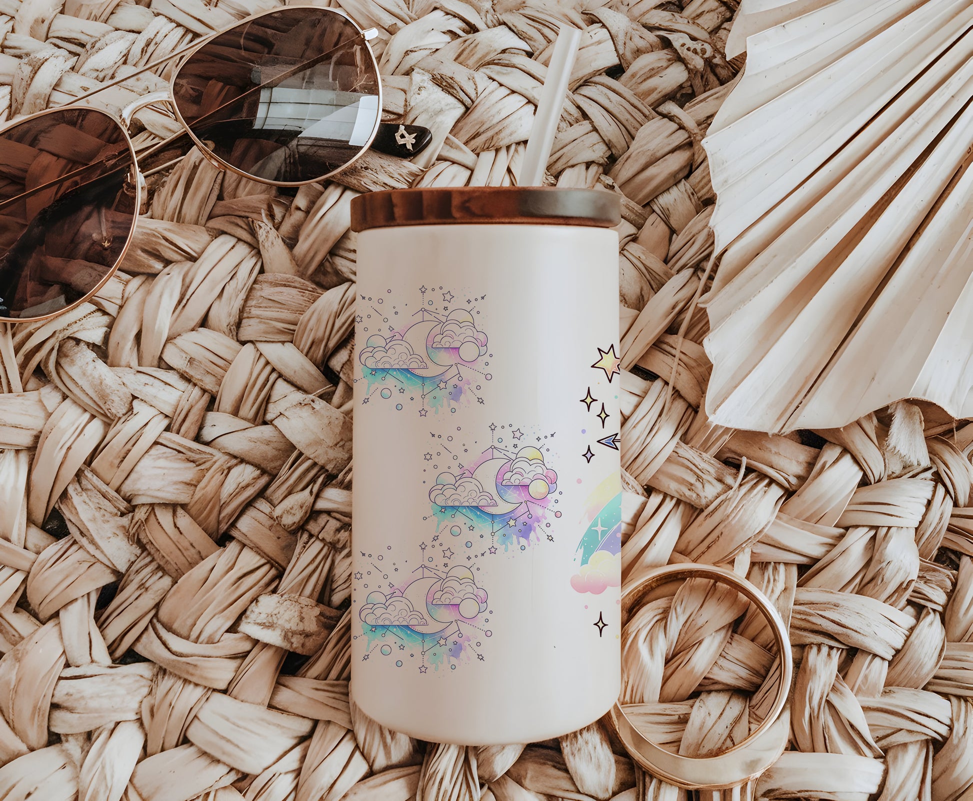 a white coffee cup sitting on top of a wicker table