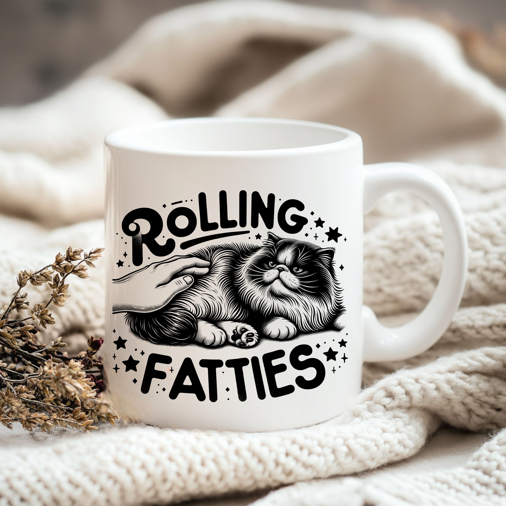 a white coffee mug with a cat on it