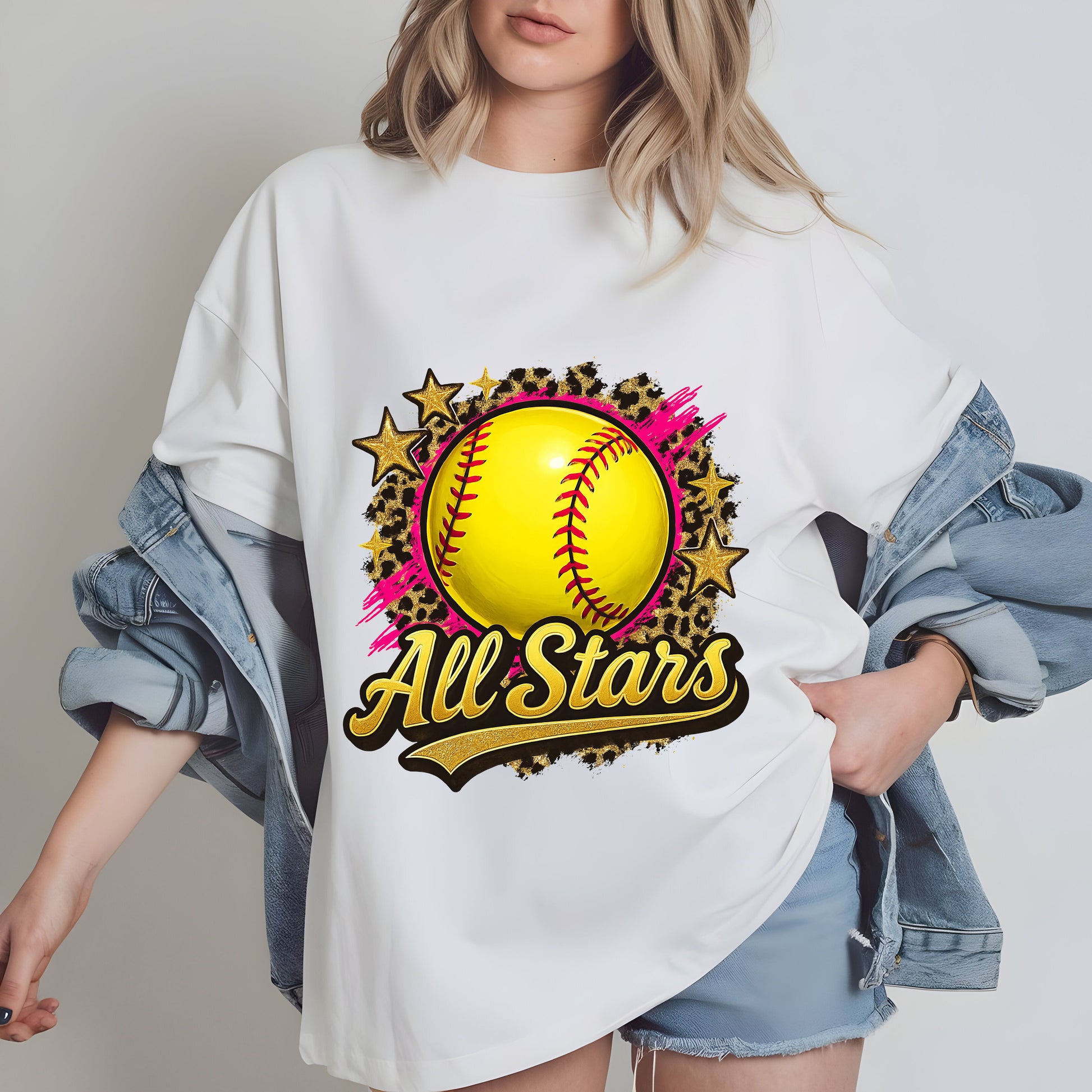 a woman wearing a t - shirt with a softball on it