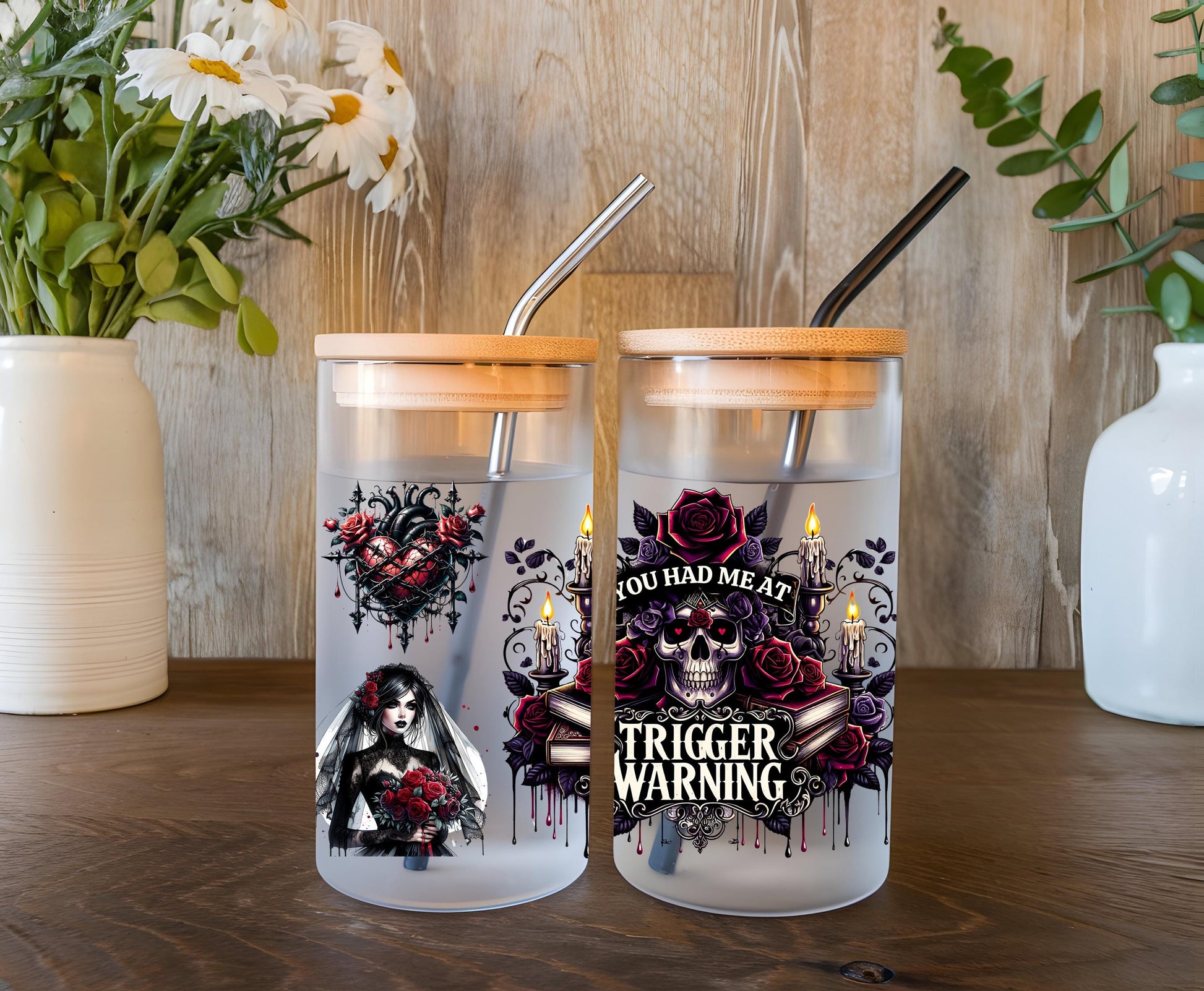 a couple of glass jars sitting on top of a wooden table